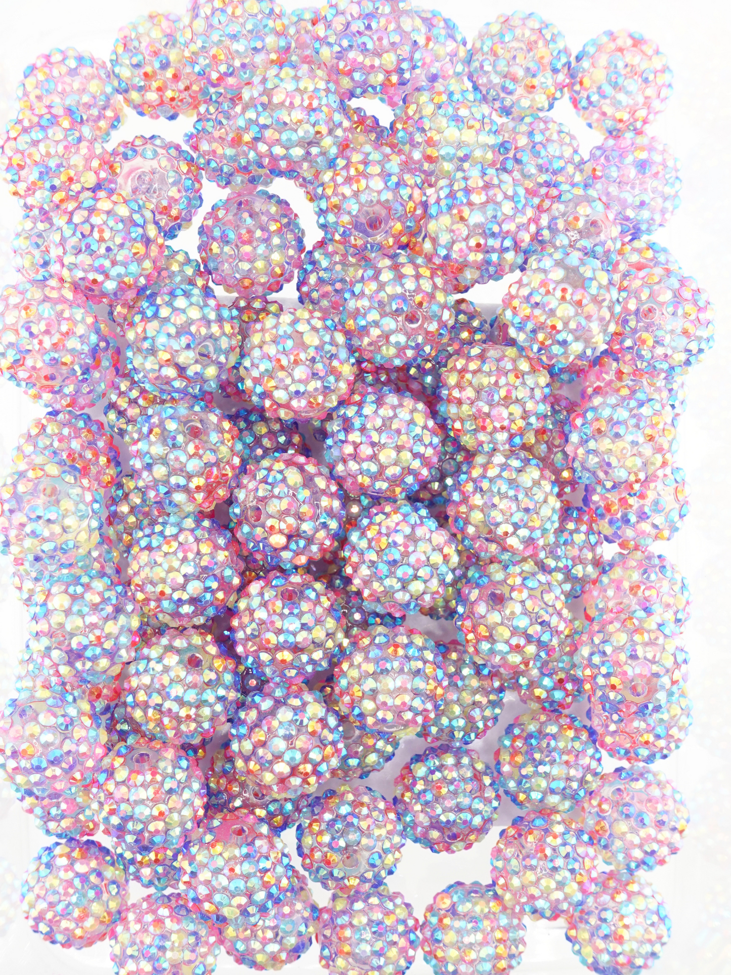 Collection of multicolored beads with shiny aurora borealis finish and rhinestone texture