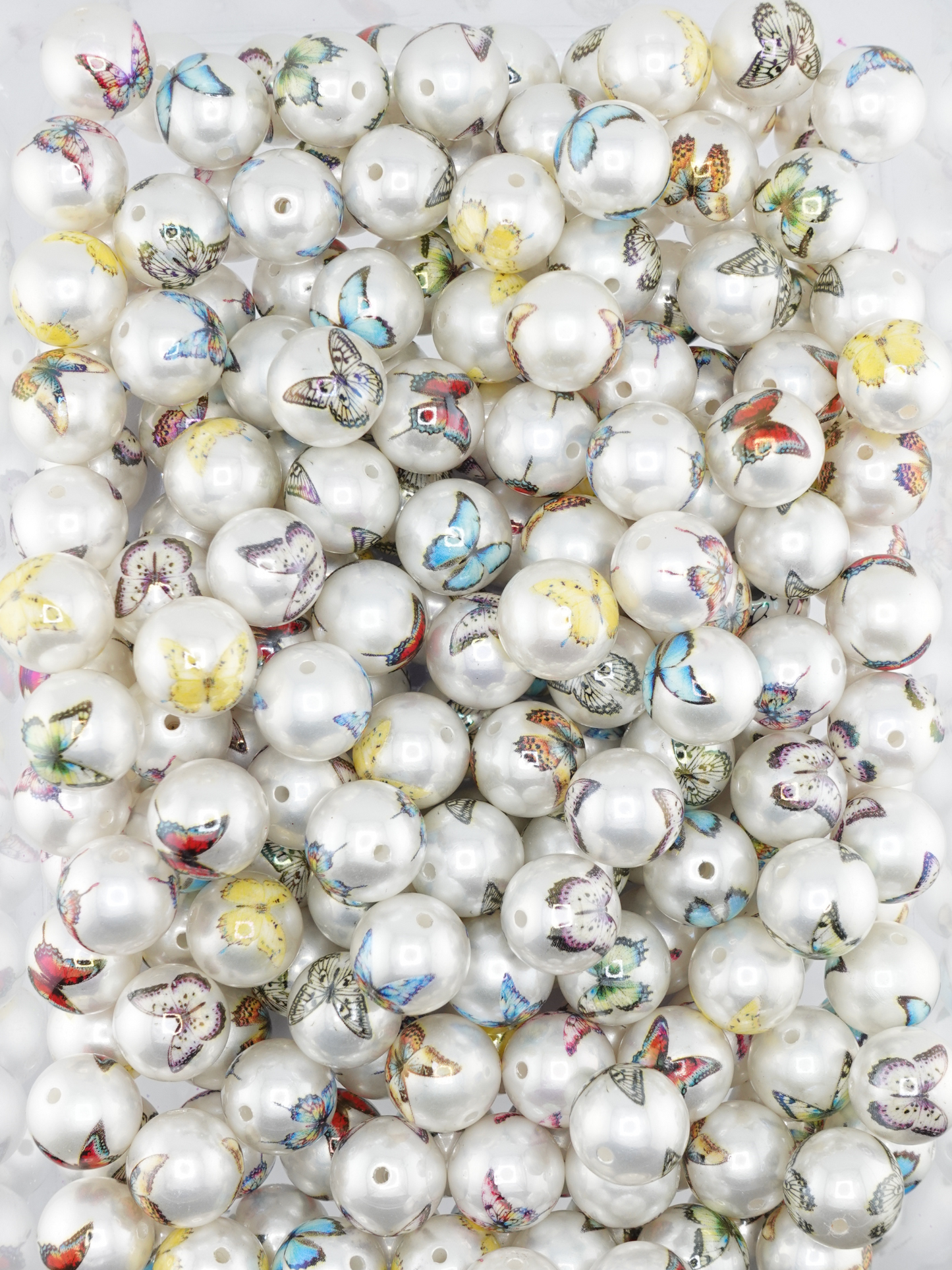 Collection of beads with a butterfly print design