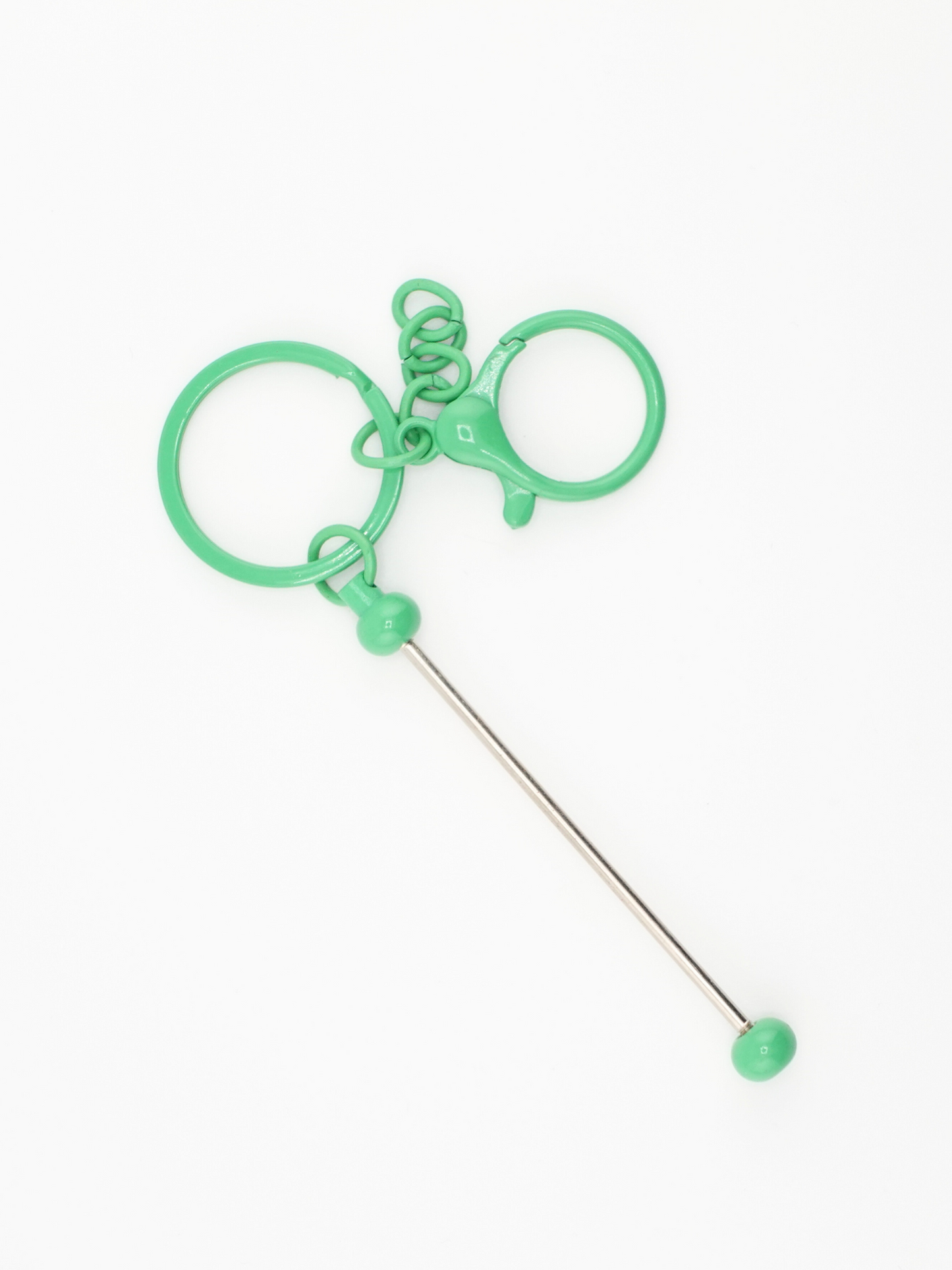 A single dark green colored beadable keychain