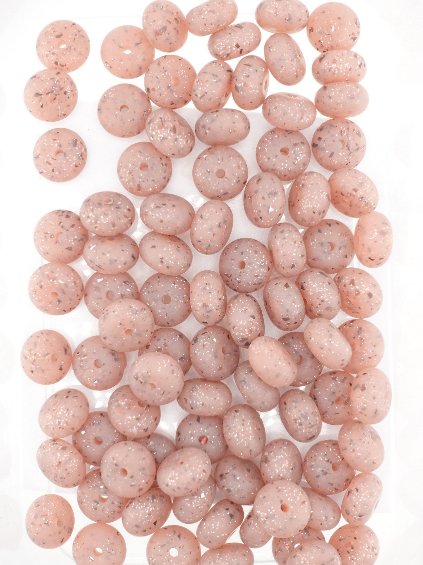 Collection of aqua brown silicone spacers with confetti design