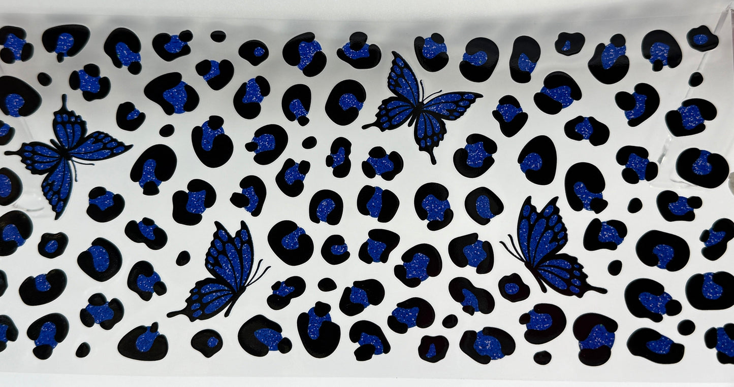 Patterned fabric with blue butterflies and black leopard print