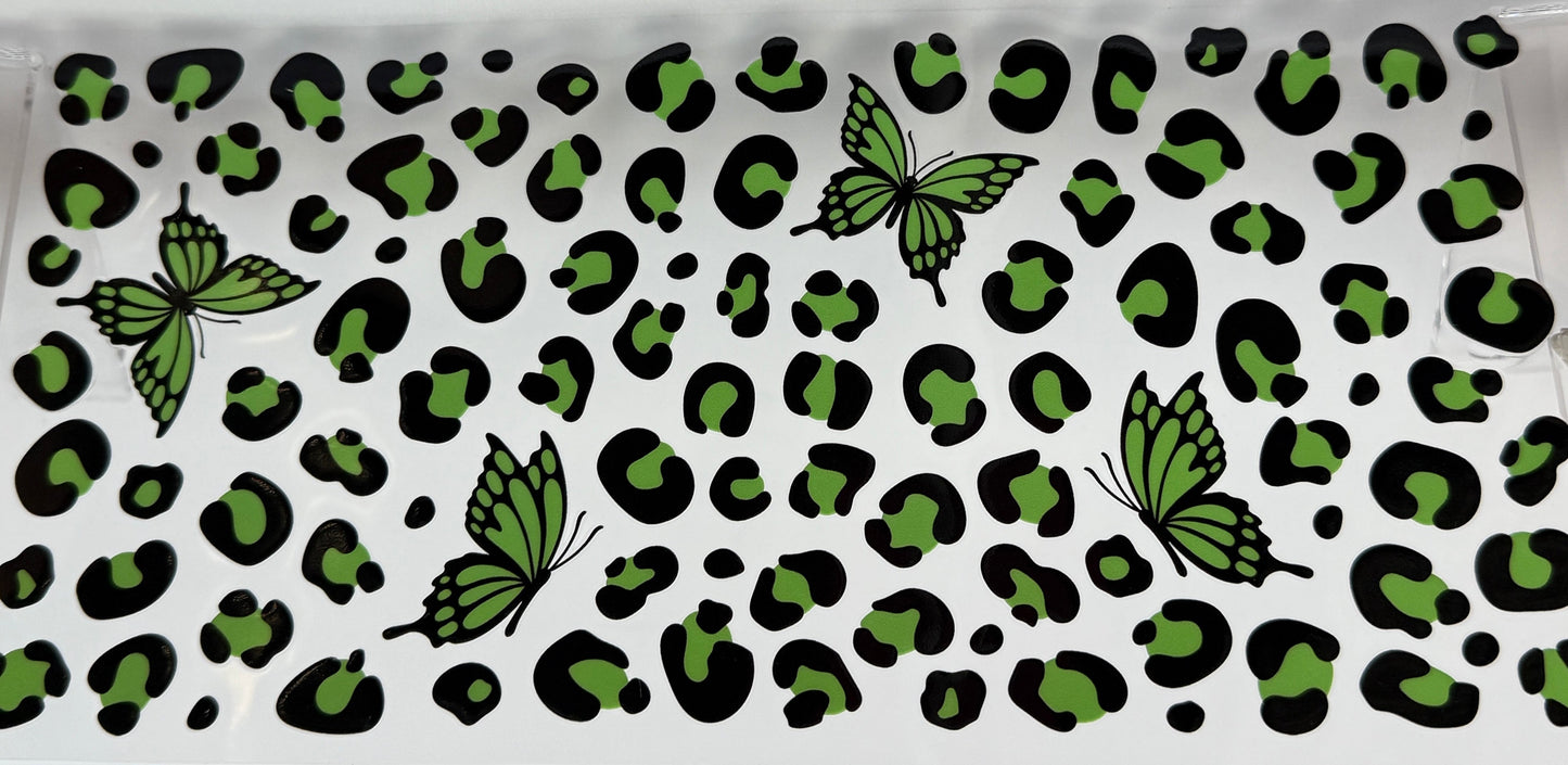 Pattern with black and green butterflies