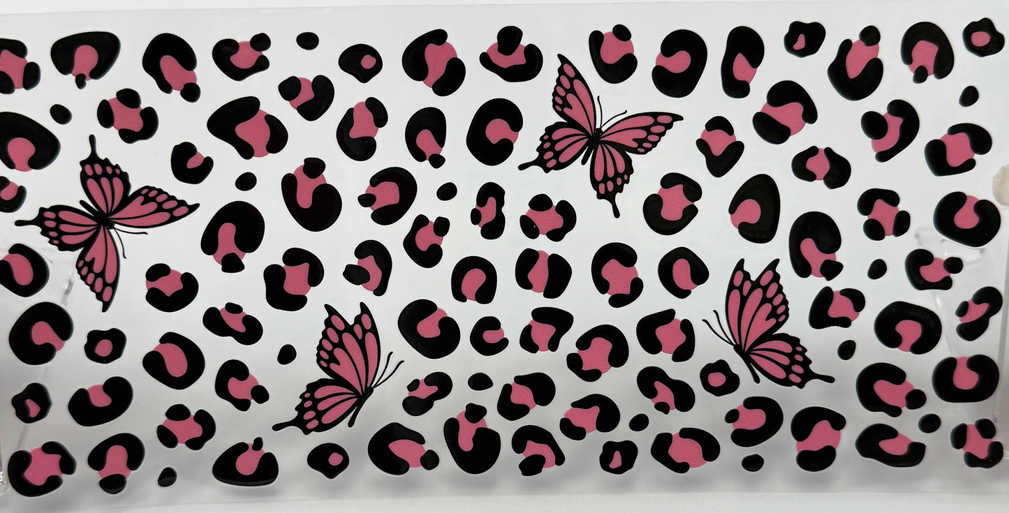 Patterned fabric with pink and black butterfly design