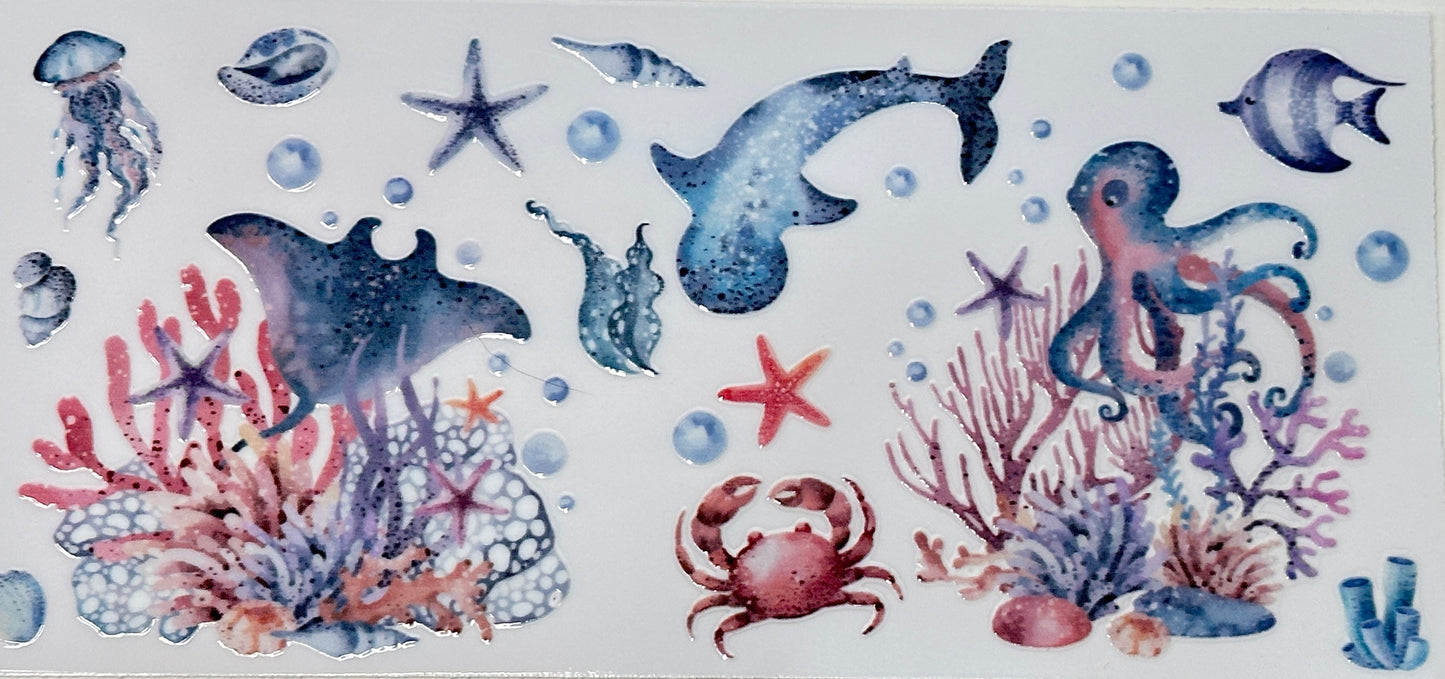 Colorful underwater scene with various sea creatures and plants