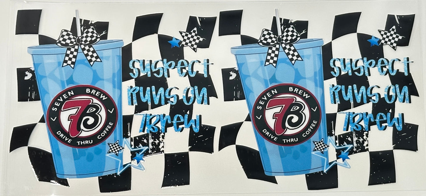 Two blue cups with 7-Eleven logo on a checkered background