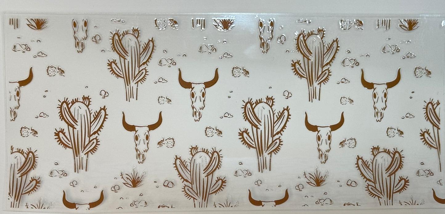 Decorative glass panel with brown cactus and bull skull designs