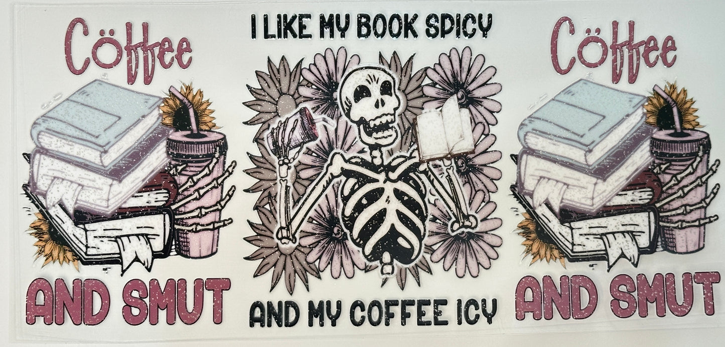 Cartoon skeleton holding a book with coffee, surrounded by text 'Coffee and Smut' and 'I Like My Book Spicy and My Coffee ICY'.