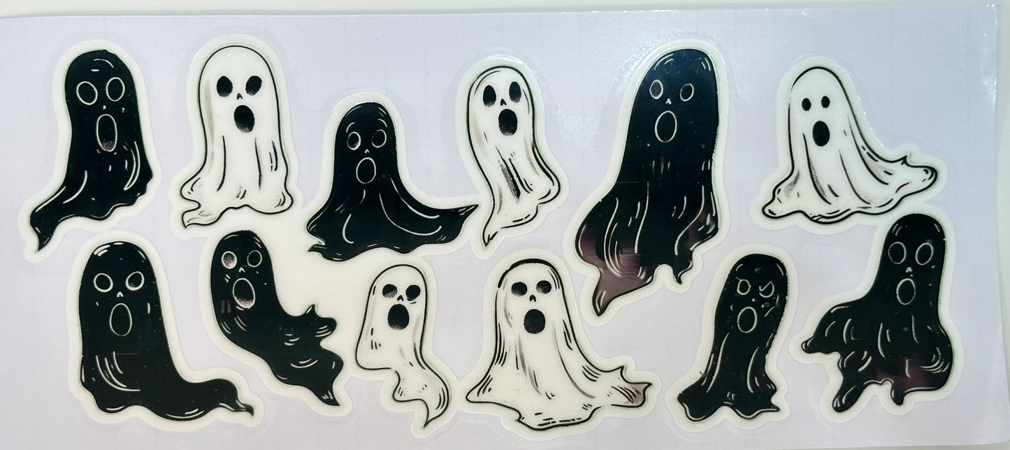 Set of ghost-shaped stickers in various designs
