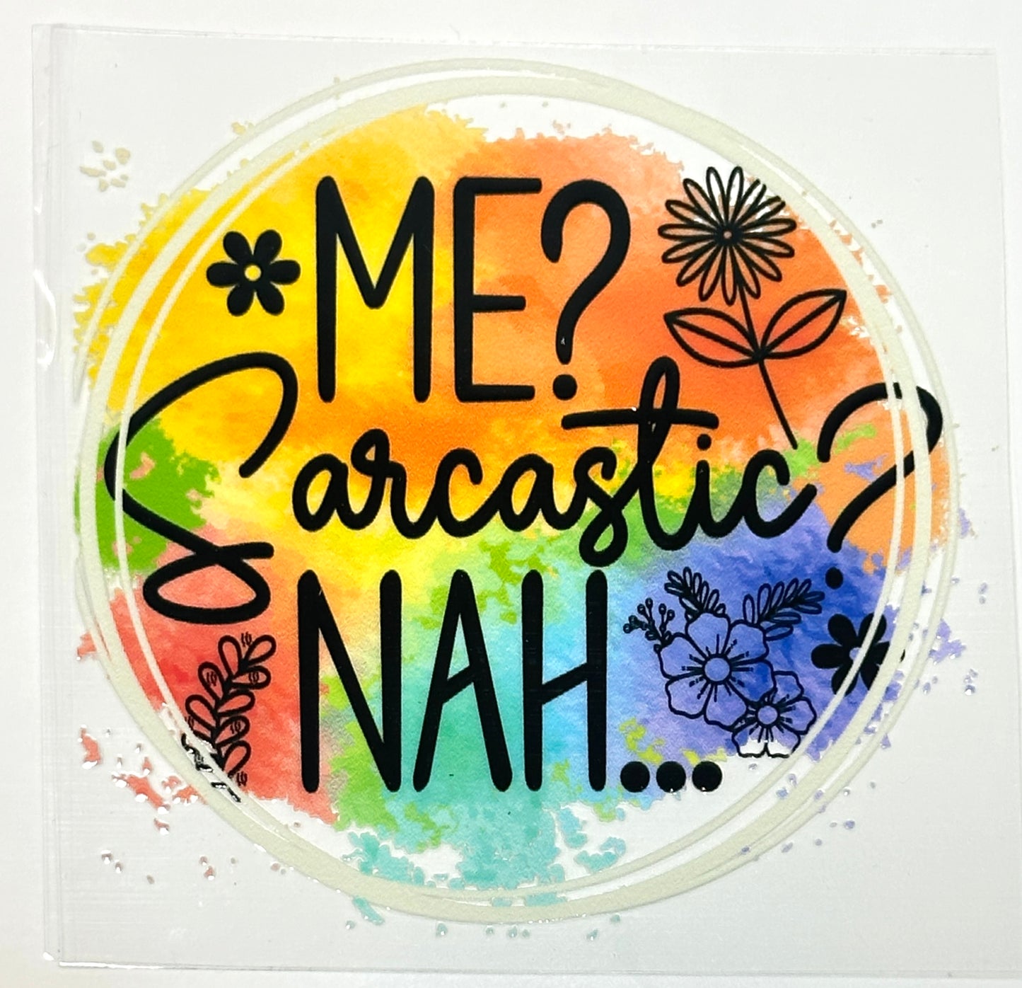 Colorful round sticker with text 'ME? Sarcastic? Nah...' and floral designs