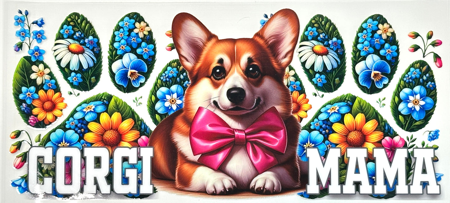Sticker with a corgi dog wearing a pink bow tie surrounded by colorful flowers and the text 'GORDI MAMA'.