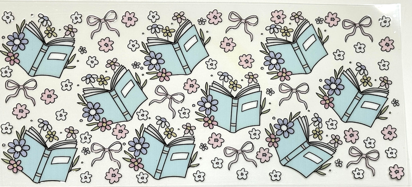 Pattern of books, flowers, and ribbons on a light background