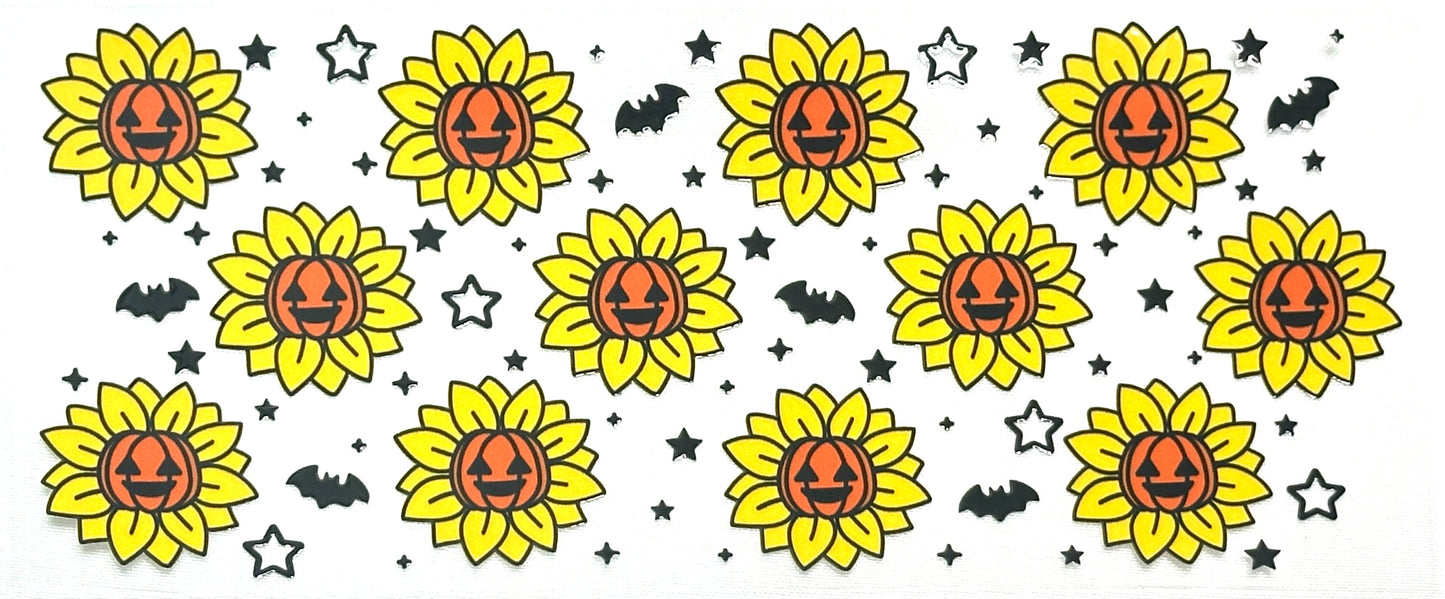 Pattern of sunflowers with pumpkin faces and small bats and stars