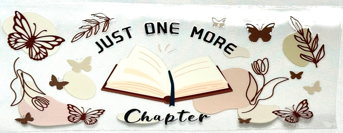 Decorative book with butterflies and leaves with text 'Just One More Chapter'