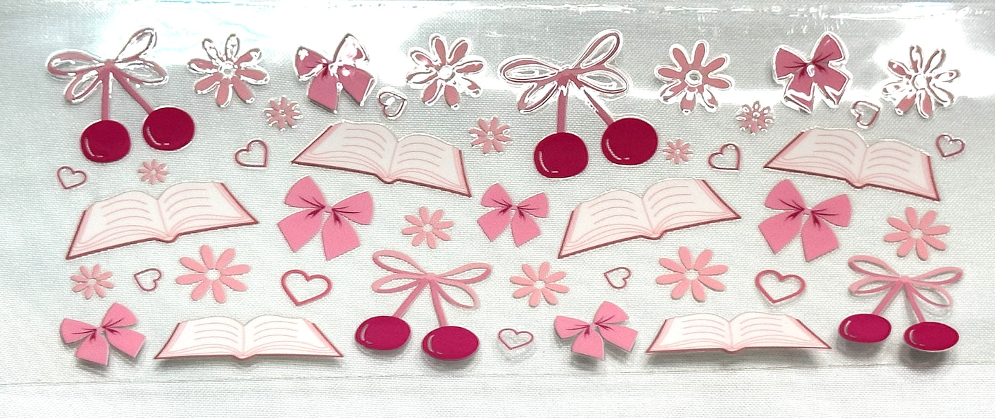 Decorative elements including books, bows, and flowers