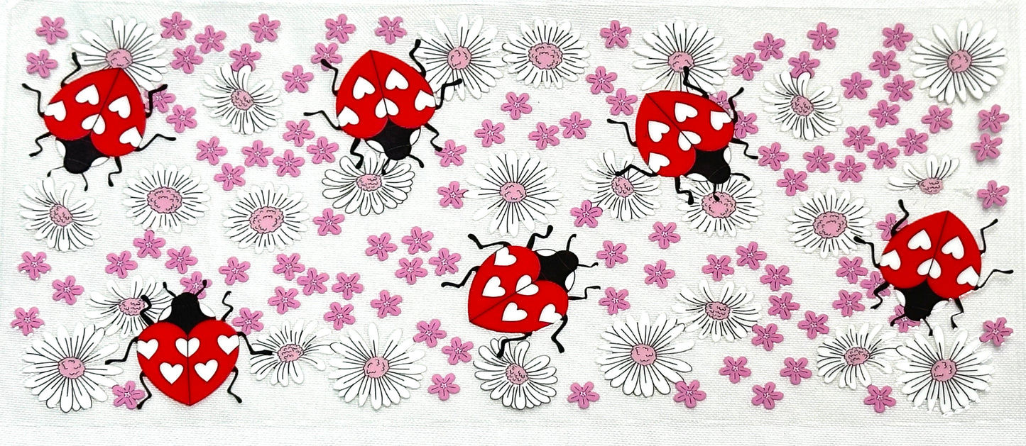 Pattern of red ladybugs and pink flowers
