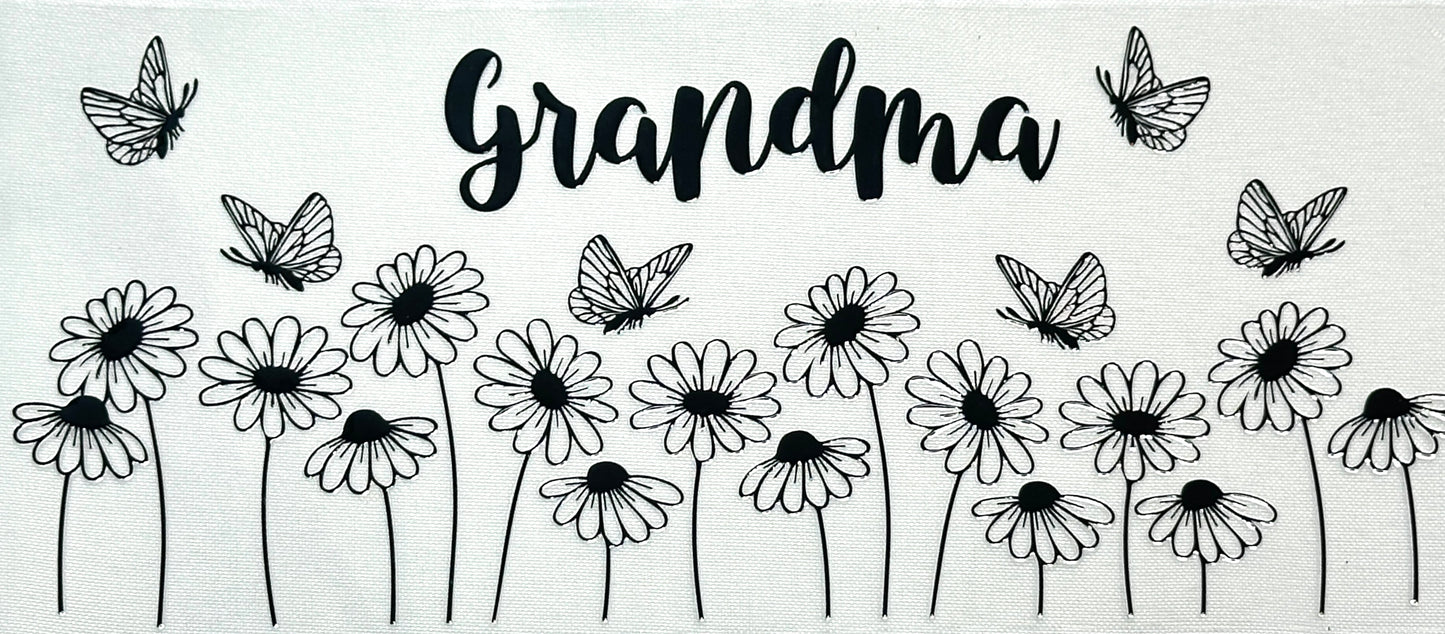 Black and white illustration of flowers and butterflies with 'Grandma' text