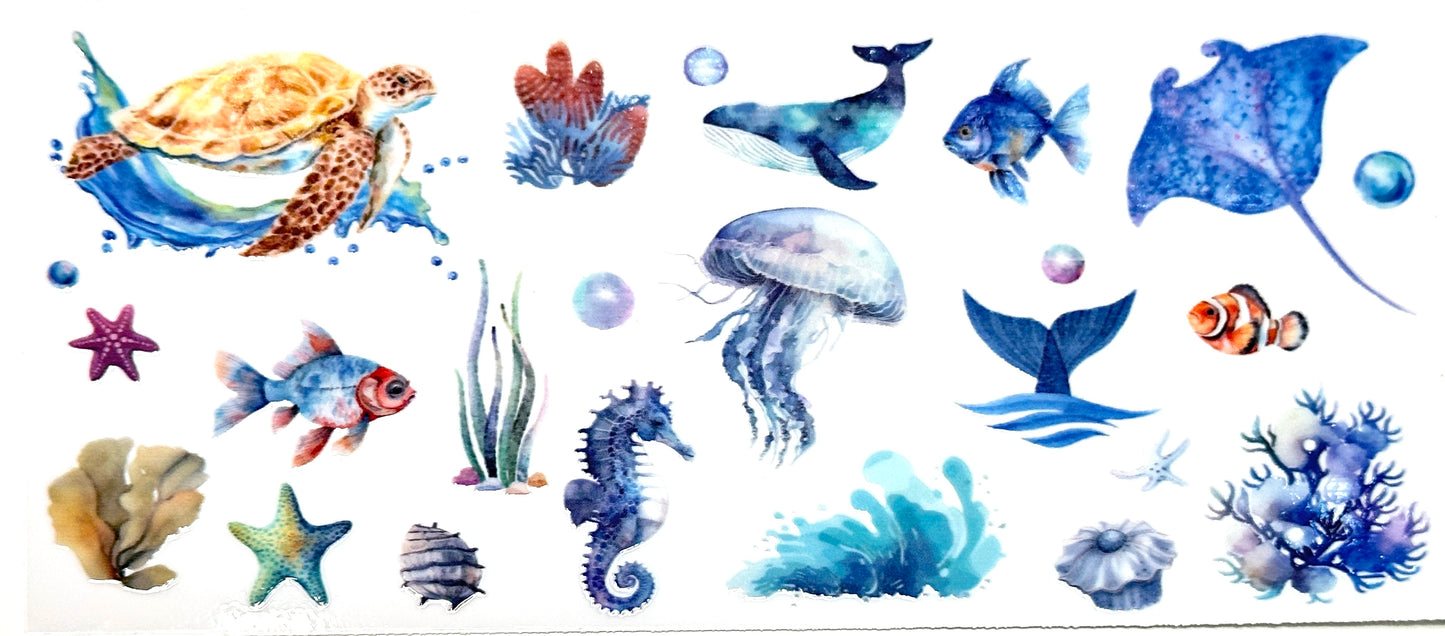 Collection of underwater-themed illustrations including fish, a turtle, jellyfish, and seahorse on a white background.