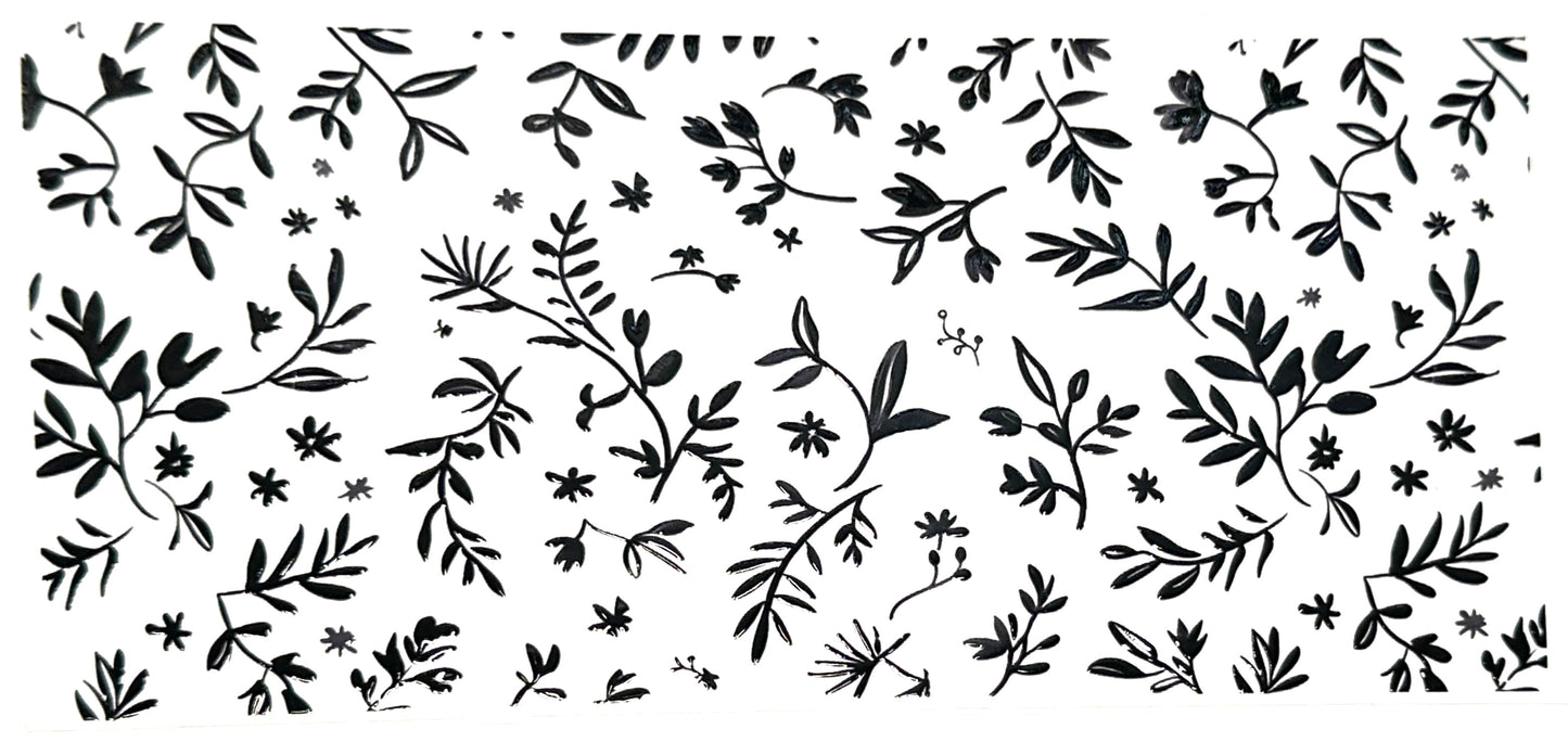 Black floral pattern on a white background