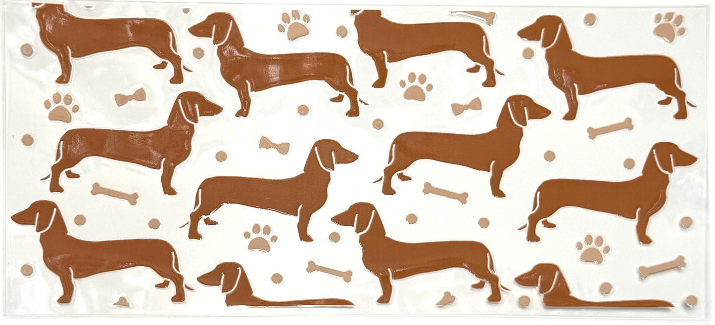 Pattern of dachshunds, bones, and paw prints on a white background