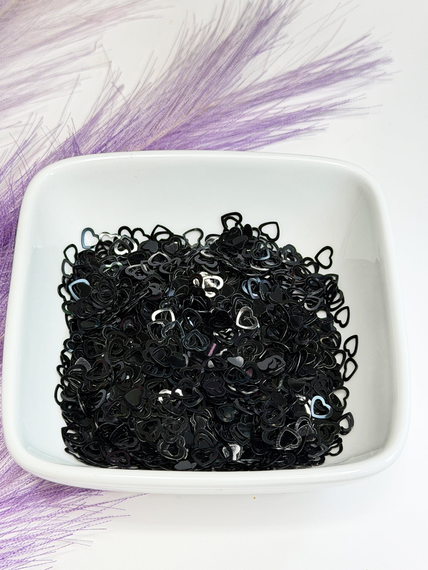 H109 Black Hollow Hearts Glitter