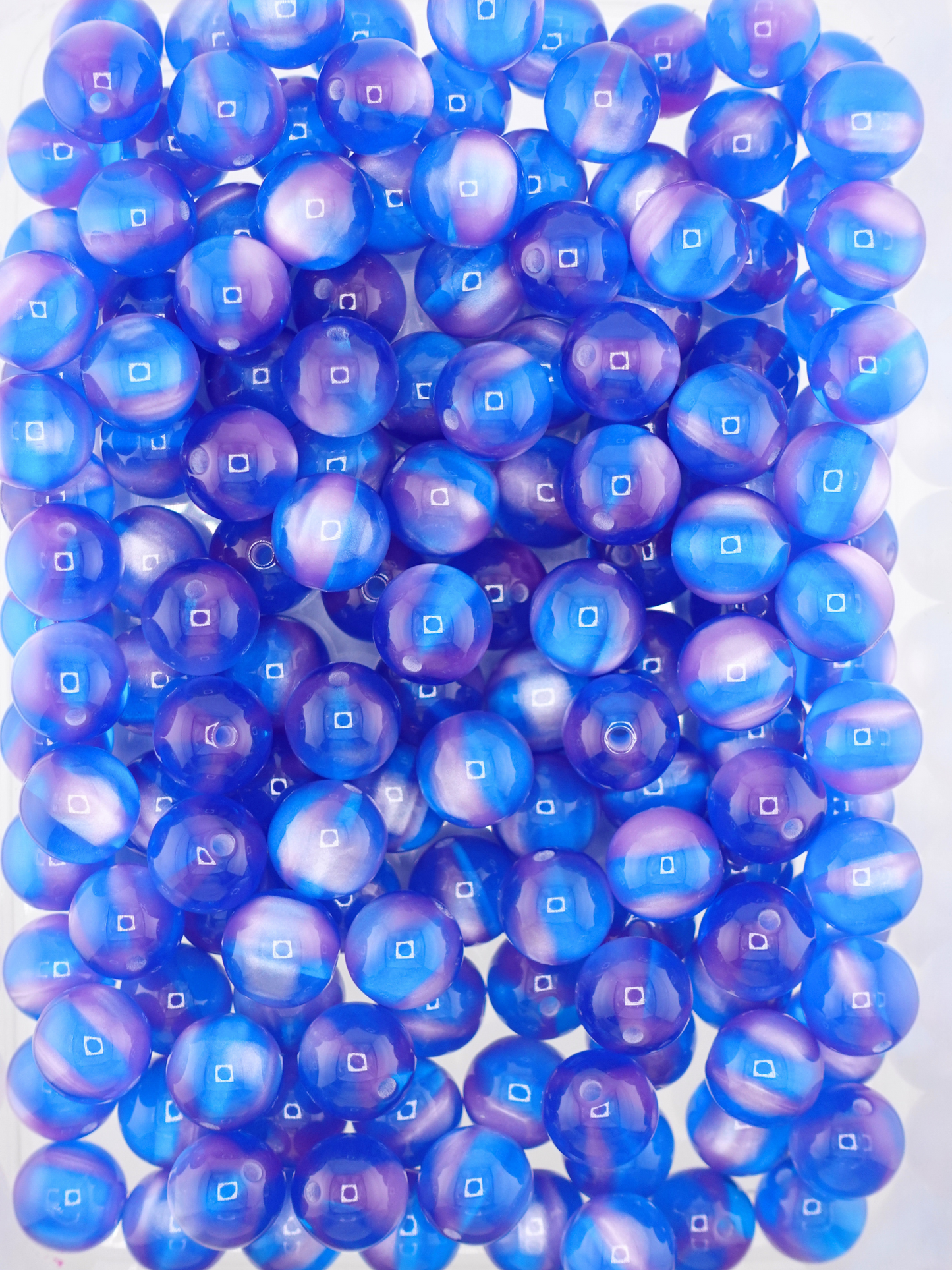 Collection of volcano beads in the colors blue and purple