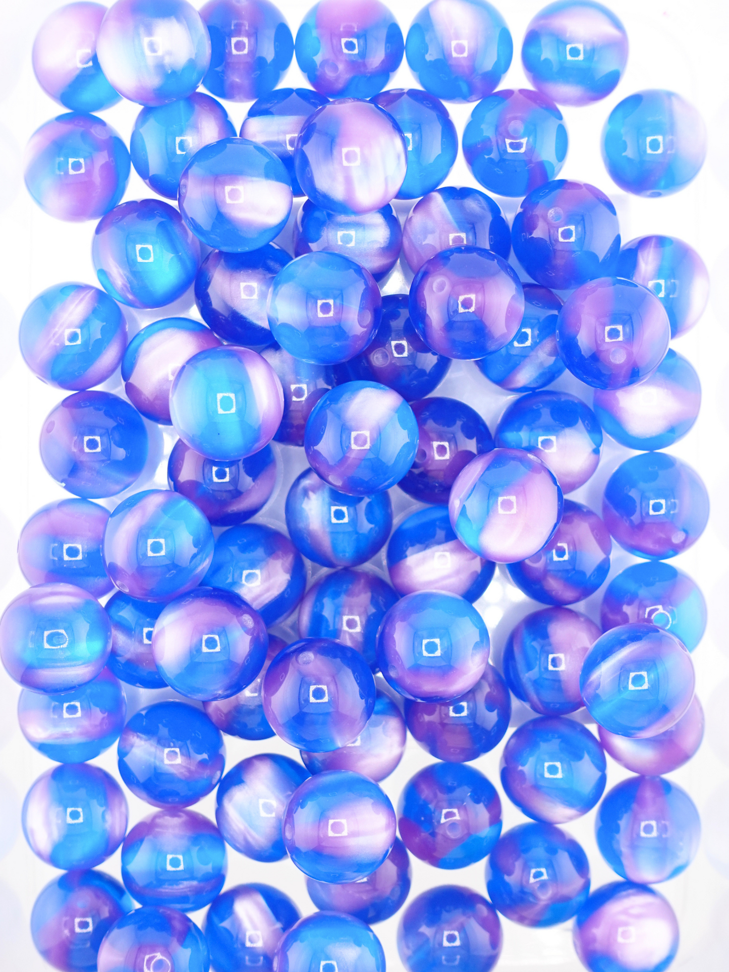 Collection of volcano beads in the colors blue and purple