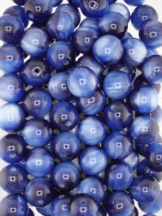 Collection of blue colored volcano beads