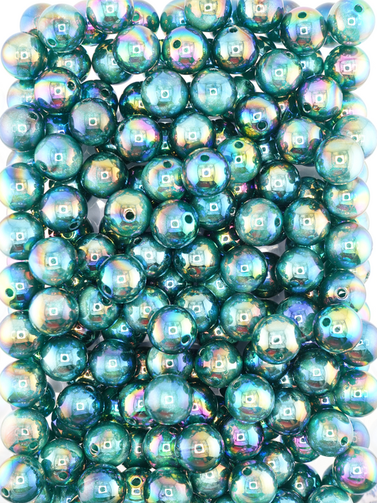 Collection of emerald green colored beads with an aurora borealis and galaxy shimmer
