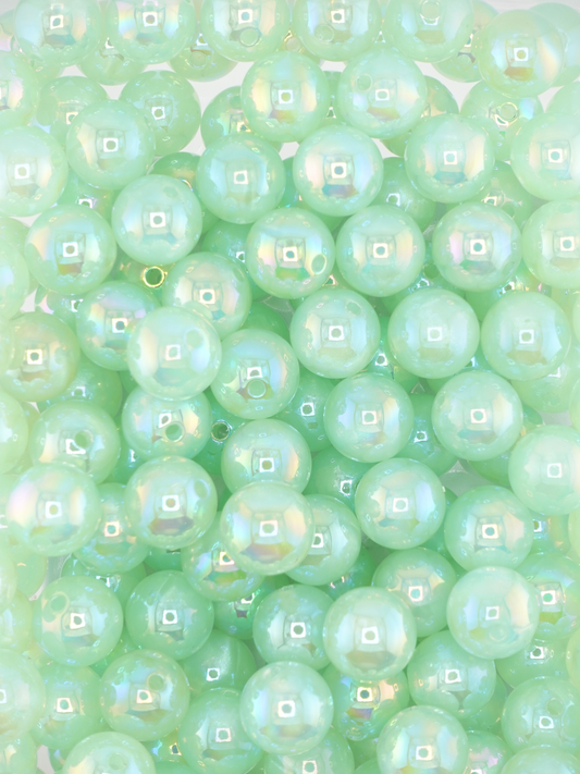 Collection of mint colored beads with an aurora borealis shimmer
