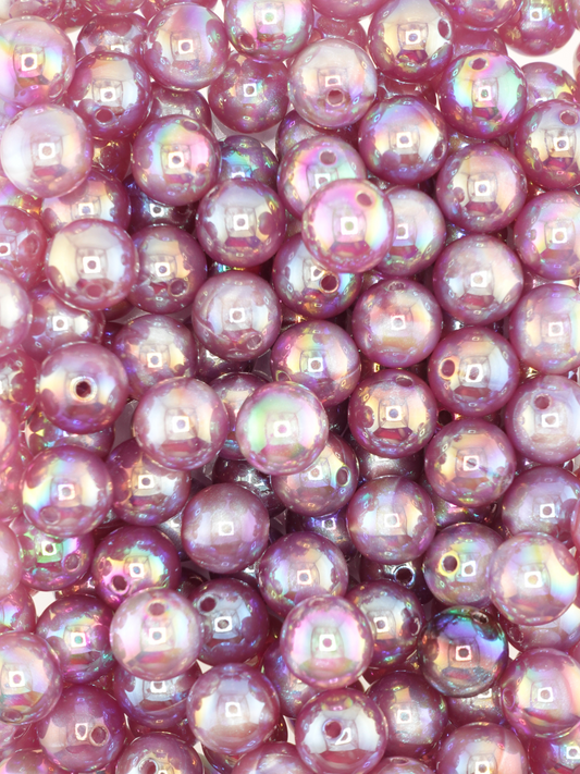 Collection of plum colored beads with an aurora borealis shimmer