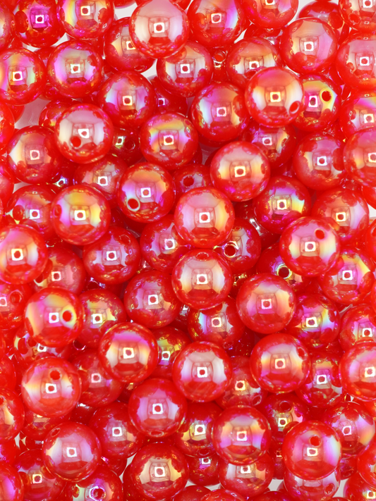 Collection of red colored beads with an aurora borealis shimmer