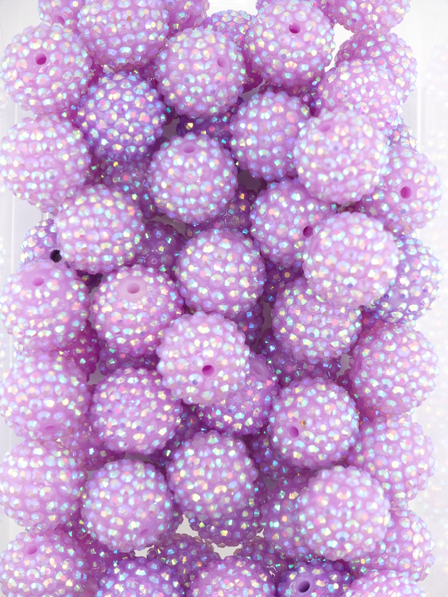 Collection of lilac purple rhinestone beads with an aurora borealis finish