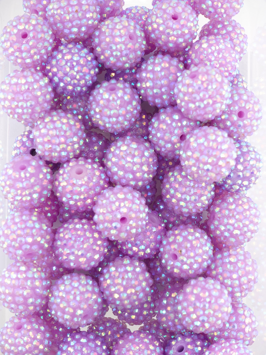 Collection of lilac purple rhinestone beads with an aurora borealis finish