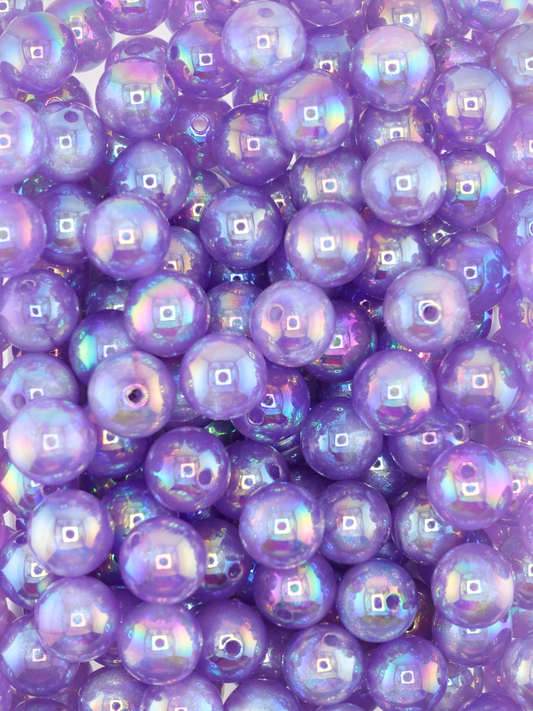 Collection of light purple colored beads with an aurora borealis shimmer