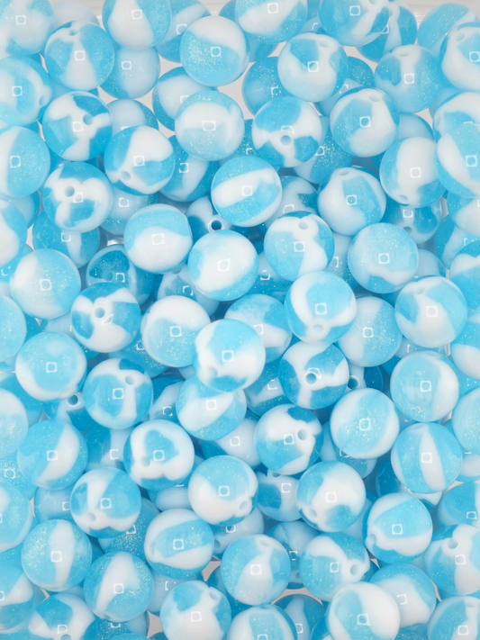 Collection of aqua/blue colored creme beads