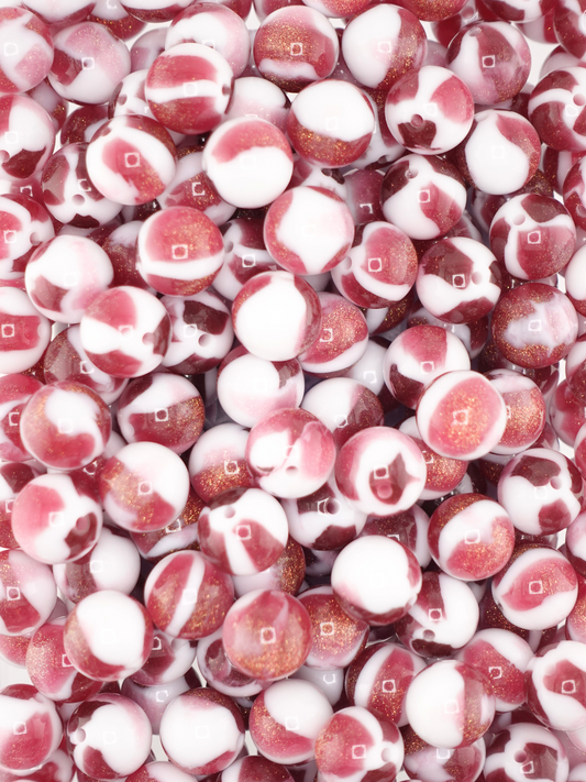 Collection of burgundy colored creme beads
