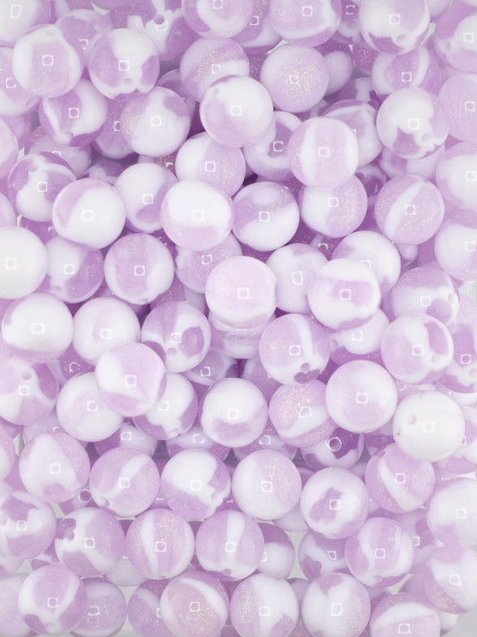 Collection of lavender colored creme beads