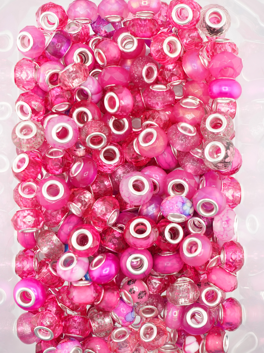 A mix of dark pink colored spacers