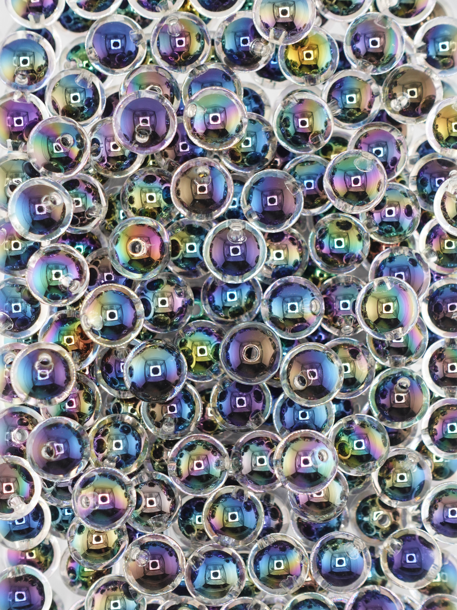 Collection of black colored double layered beads, iridescent hue