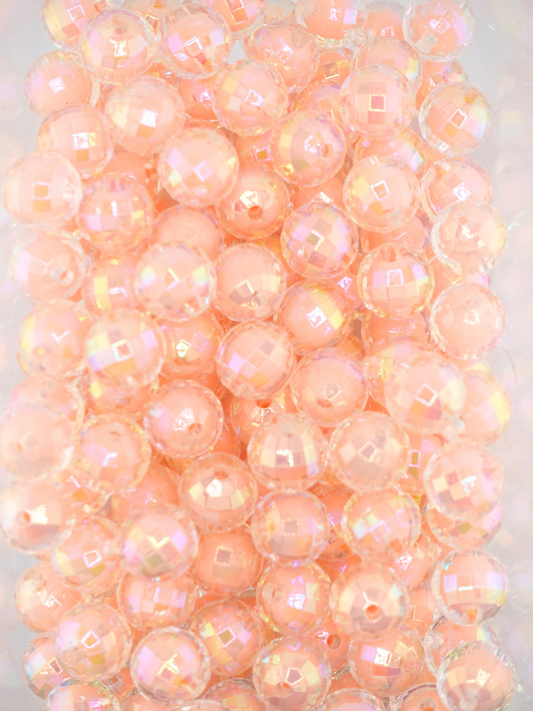 Collection of double layered disco beads in a peach color