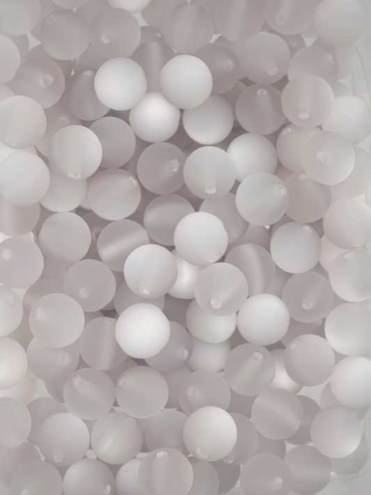 Collection of frosted cat eye beads with a light grey color