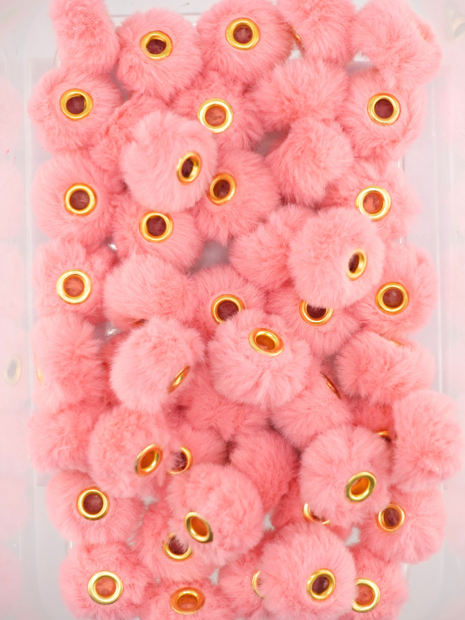 Collection of medium pink fuzzy pom pom spacers