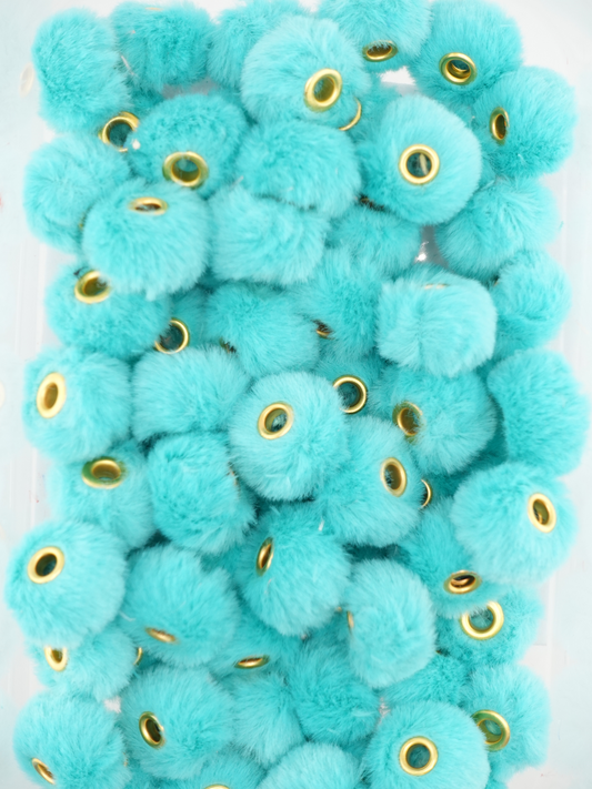 Collection of teal fuzzy pom pom spacers