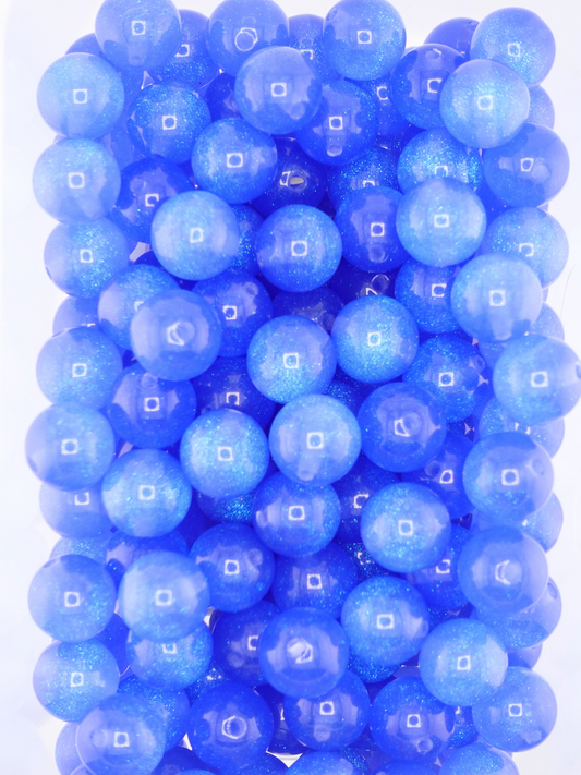 Collection of royal blue colored beads with a galaxy shimmer