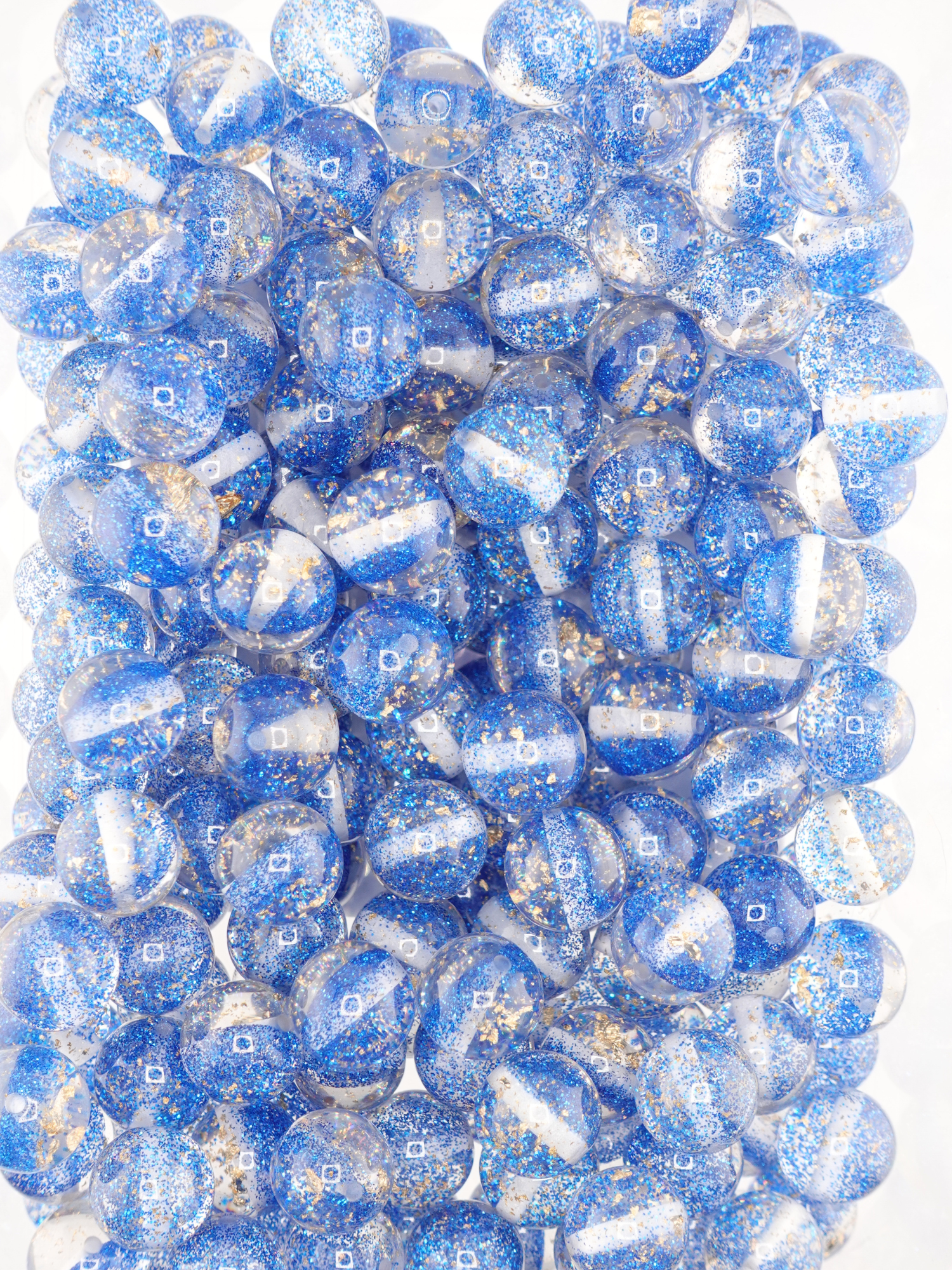 Collection of half glitter beads in blue
