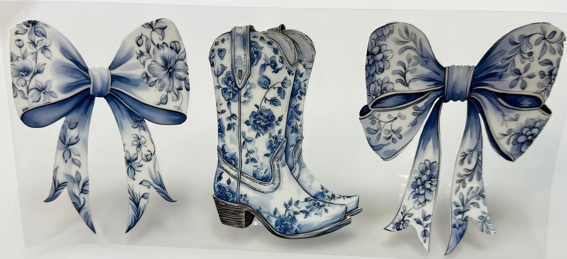 Decorative boots with blue floral patterns and matching bows 