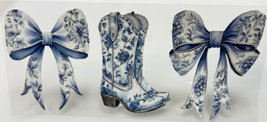 Decorative boots with blue floral patterns and matching bows 