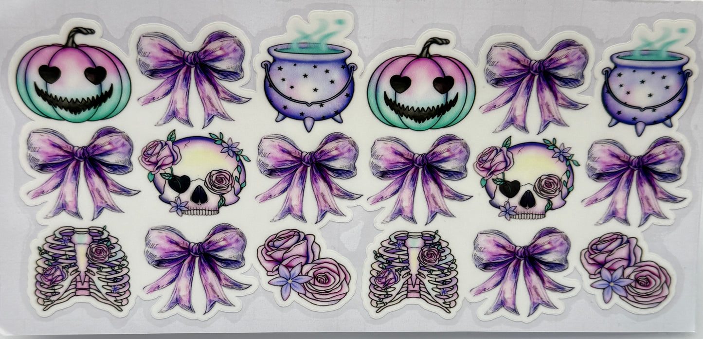 Set of Halloween-themed pumpkins, rib cages, and bows 