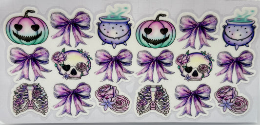 Set of Halloween-themed pumpkins, rib cages, and bows 