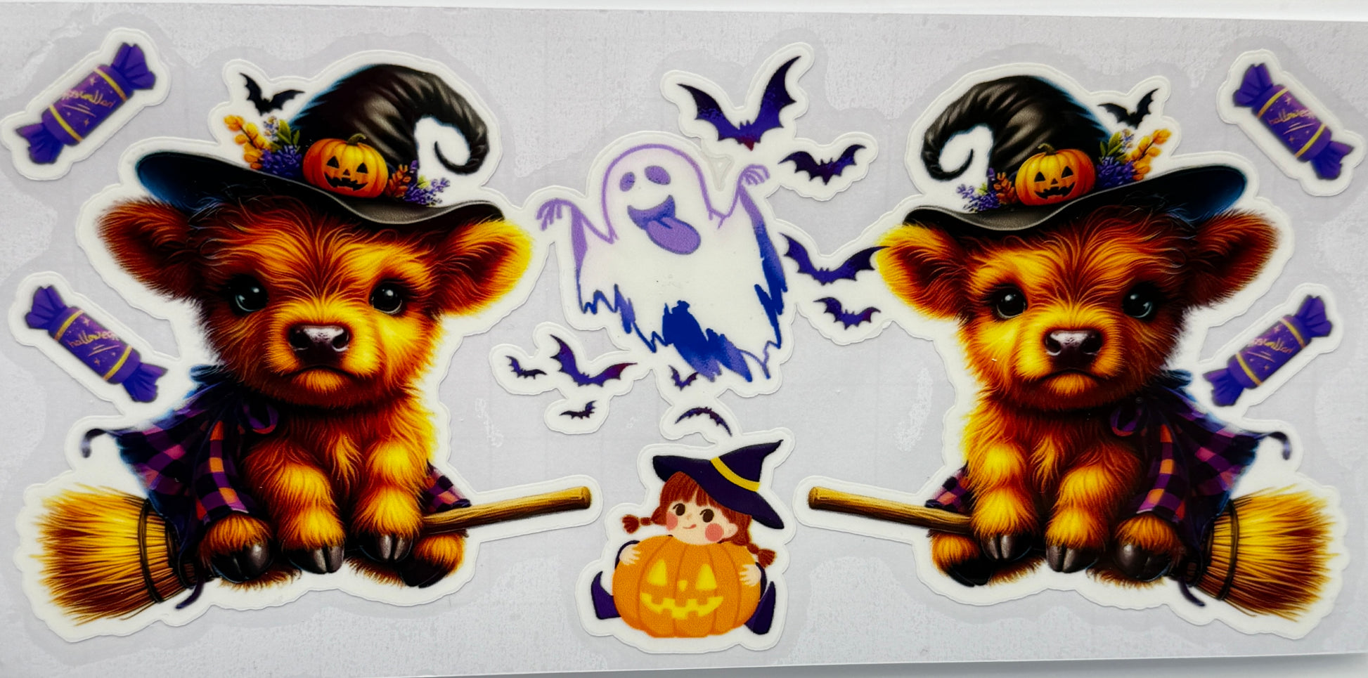 Halloween-themed cows  in witch costumes, ghosts, and candy 